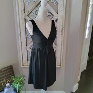 Cover Me Women's Sleeveless V-Neck Elastic Waist Twist Swimsuit Coverup in Black